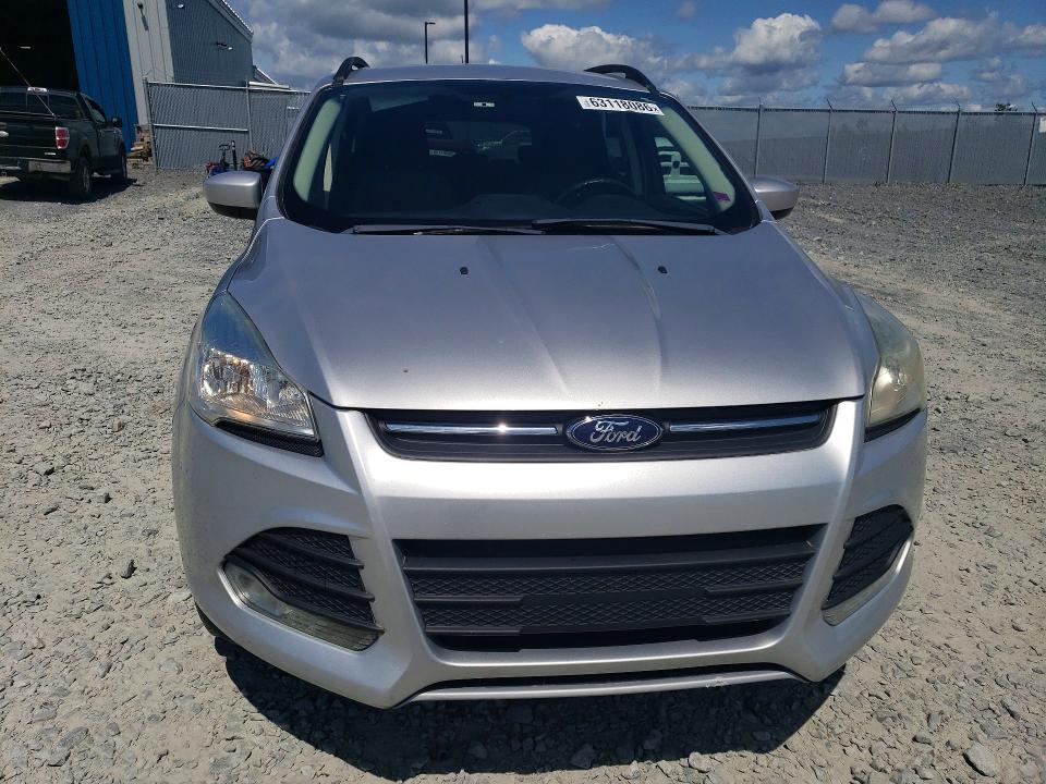 Photo 5 from auction – 2016 FORD ESCAPE with VIN 1FMCU9G90GUC15368