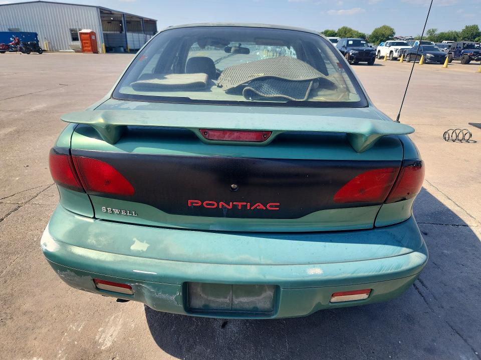 Photo 6 from auction – 1999 PONTIAC SUNFIRE with VIN 3G2JB5241XS801944