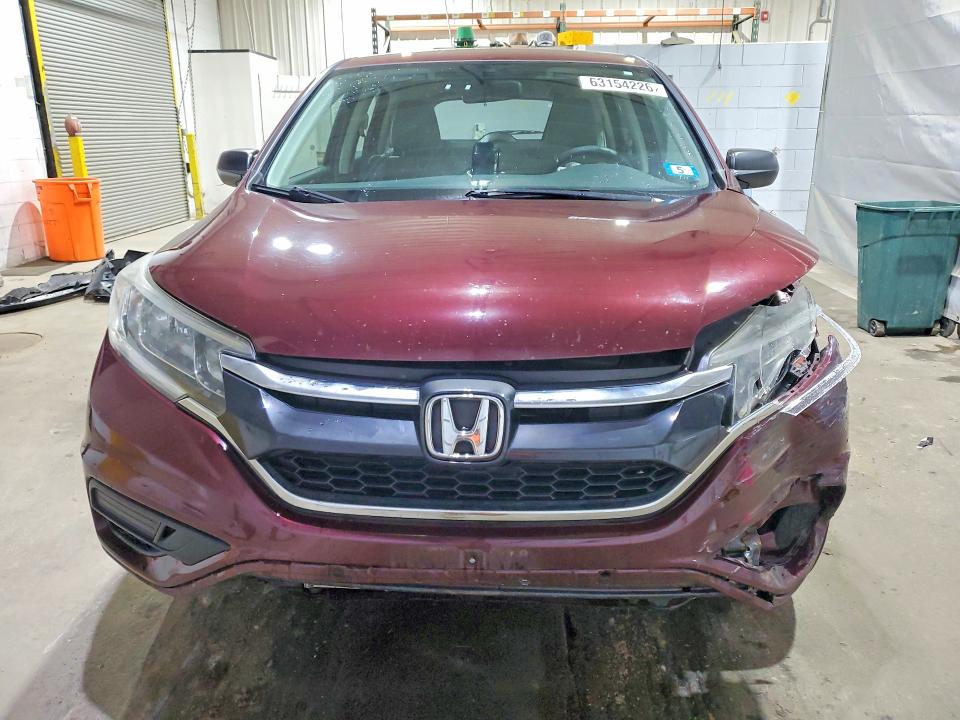 Photo 5 from auction – 2015 HONDA CR-V with VIN 2HKRM3H37FH516301