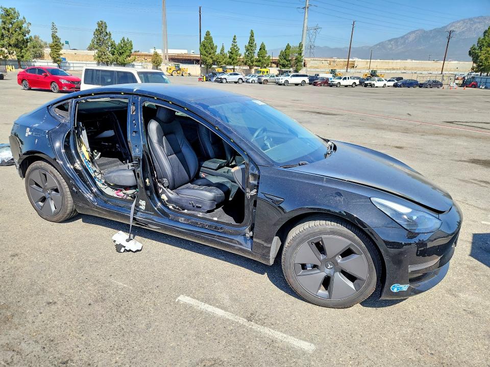 Photo 4 from auction – 2021 TESLA MODEL 3 with VIN 5YJ3E1EB2MF924039