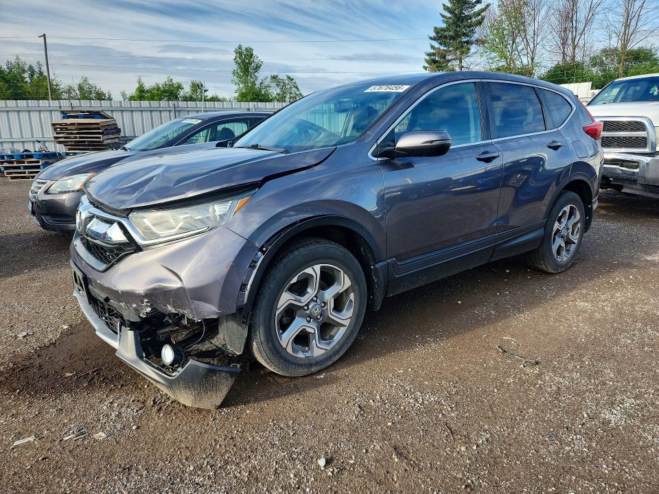HONDA CR-V 2018 with VIN 2HKRW2H83JH114283 - Photo from auction