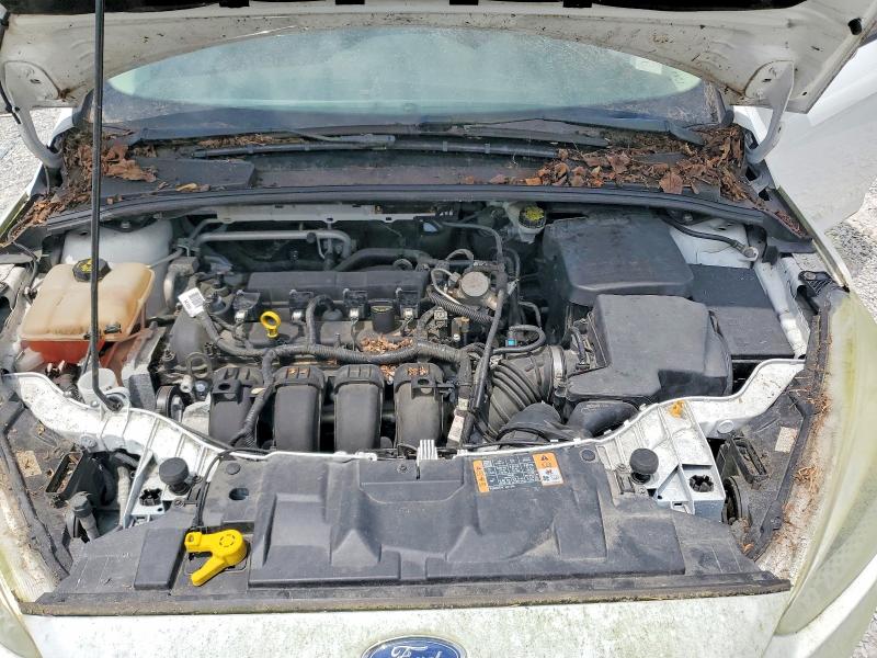 Photo 11 from auction – 2016 FORD FOCUS with VIN 1FADP3F20GL347981
