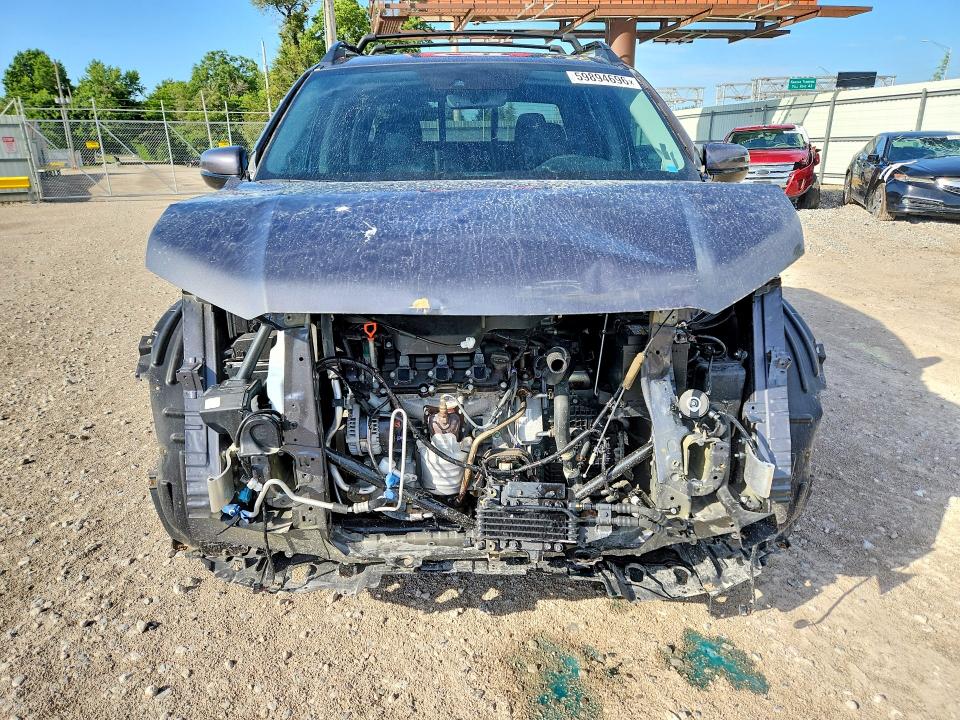 Photo 5 from auction – 2023 HONDA RIDGELINE with VIN 5FPYK3F76PB015642