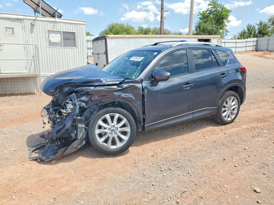 MAZDA CX-5 2015 with VIN JM3KE4DY4F0471327 - Photo from auction
