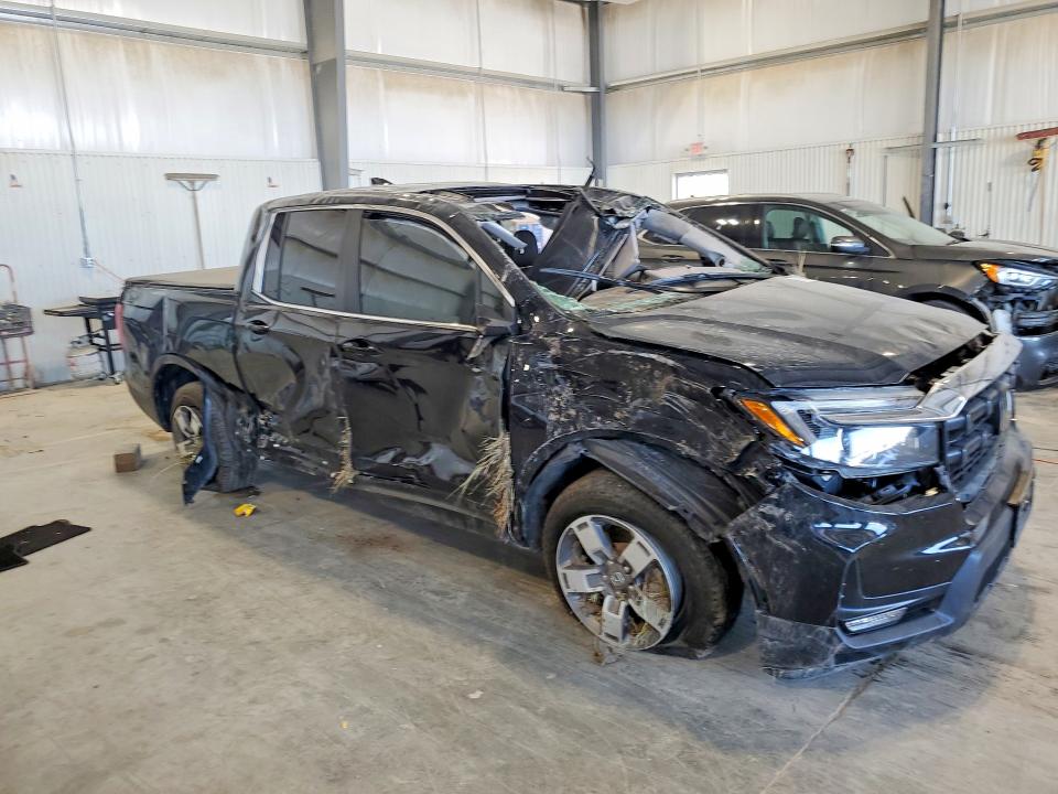 Photo 4 from auction – 2024 HONDA RIDGELINE with VIN 5FPYK3F52RB030852