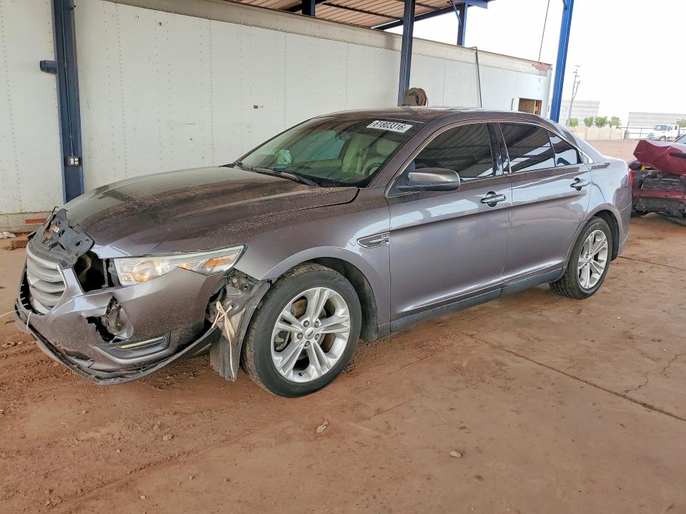 FORD TAURUS 2014 with VIN 1FAHP2E85EG100818 - Photo from auction