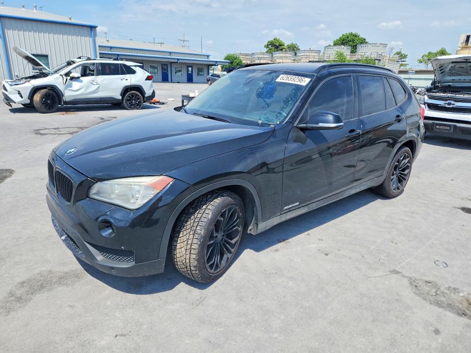 BMW X1 2014 with VIN WBAVM5C56EVV93210 - Photo from auction