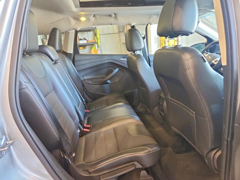 Photo 10 from auction – 2016 FORD ESCAPE with VIN 1FMCU9GX5GUB29147