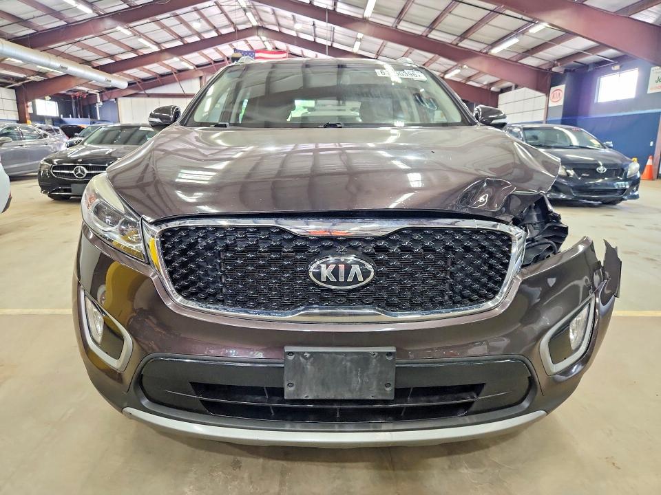 Photo 5 from auction – 2016 KIA SORENTO with VIN 5XYPHDA55GG104058