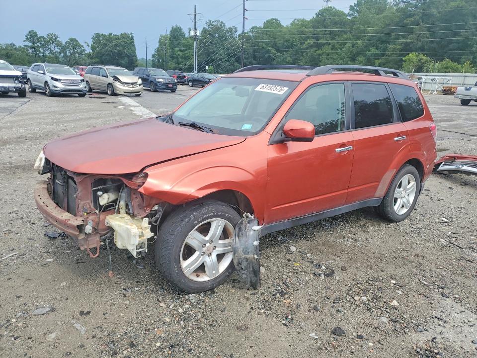 SUBARU FORESTER 2010 with VIN JF2SH6DC0AH704924 - Photo from auction