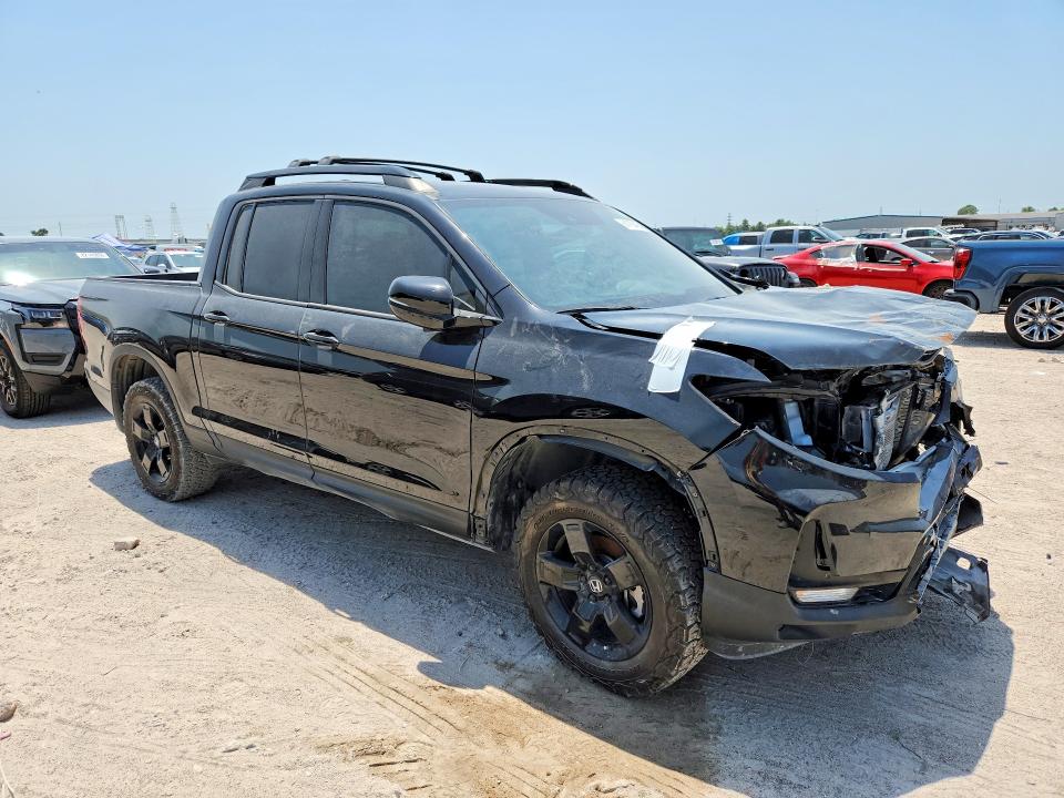 Photo 4 from auction – 2025 HONDA RIDGELINE with VIN 5FPYK3F84SB017682