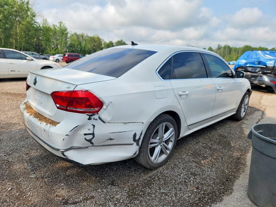 Photo 3 from auction – 2014 VOLKSWAGEN PASSAT with VIN 1VWCS7A31EC082011