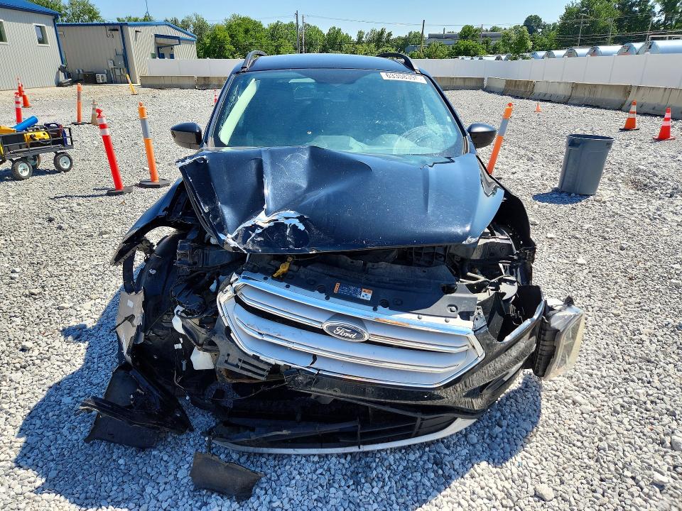 Photo 5 from auction – 2018 FORD ESCAPE with VIN 1FMCU9HD1JUC24347