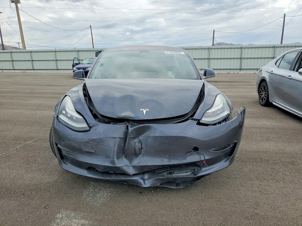 Photo 5 from auction – 2018 TESLA MODEL 3 with VIN 5YJ3E1EB7JF151418