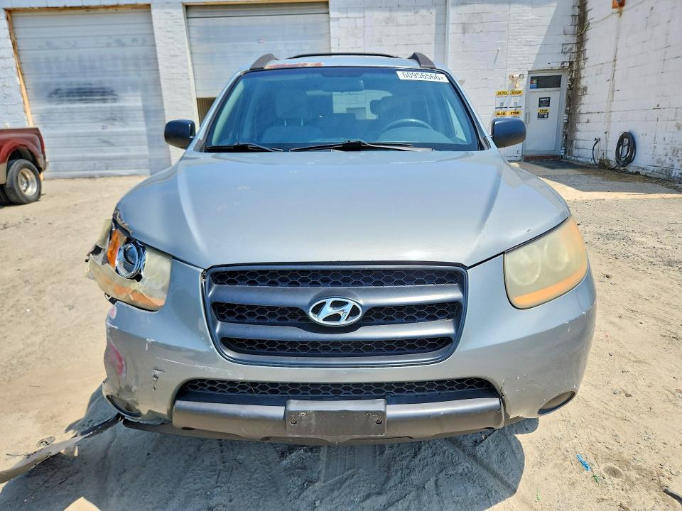Photo 5 from auction – 2009 HYUNDAI SANTA FE with VIN 5NMSG13D69H300907