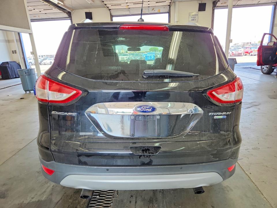 Photo 6 from auction – 2016 FORD ESCAPE with VIN 1FMCU9J90GUC44636