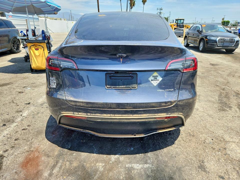 Photo 6 from auction – 2023 TESLA MODEL Y with VIN 7SAYGDEEXPF909985