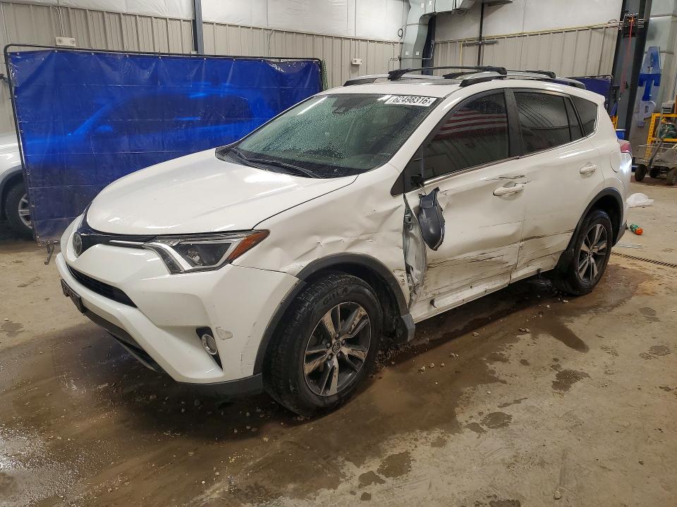 TOYOTA RAV4 2017 with VIN JTMRFREV0HD218586 - Photo from auction