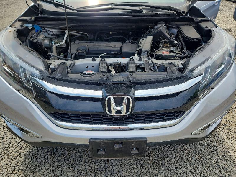 Photo 12 from auction – 2016 HONDA CR-V with VIN 2HKRM4H58GH686174