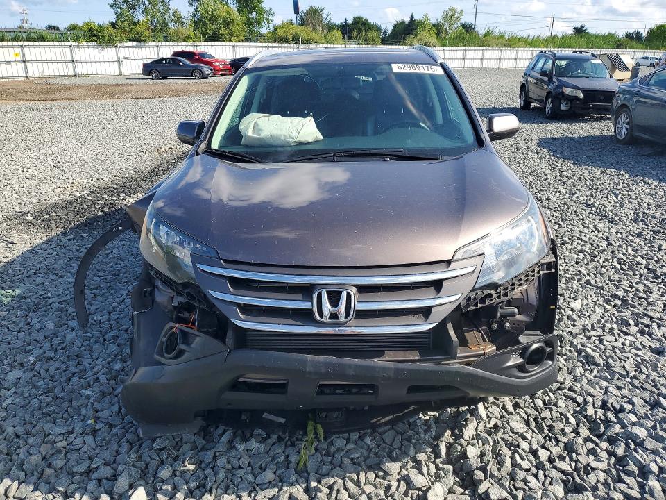 Photo 5 from auction – 2014 HONDA CR-V with VIN 2HKRM3H71EH566080