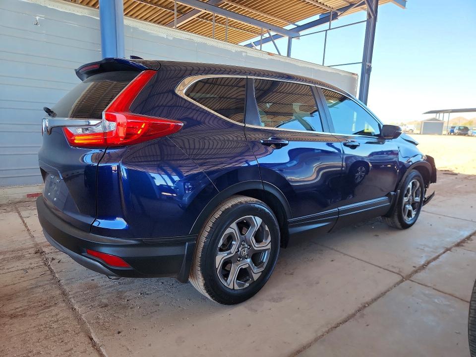 Photo 3 from auction – 2018 HONDA CR-V with VIN 5J6RW1H8XJA012894