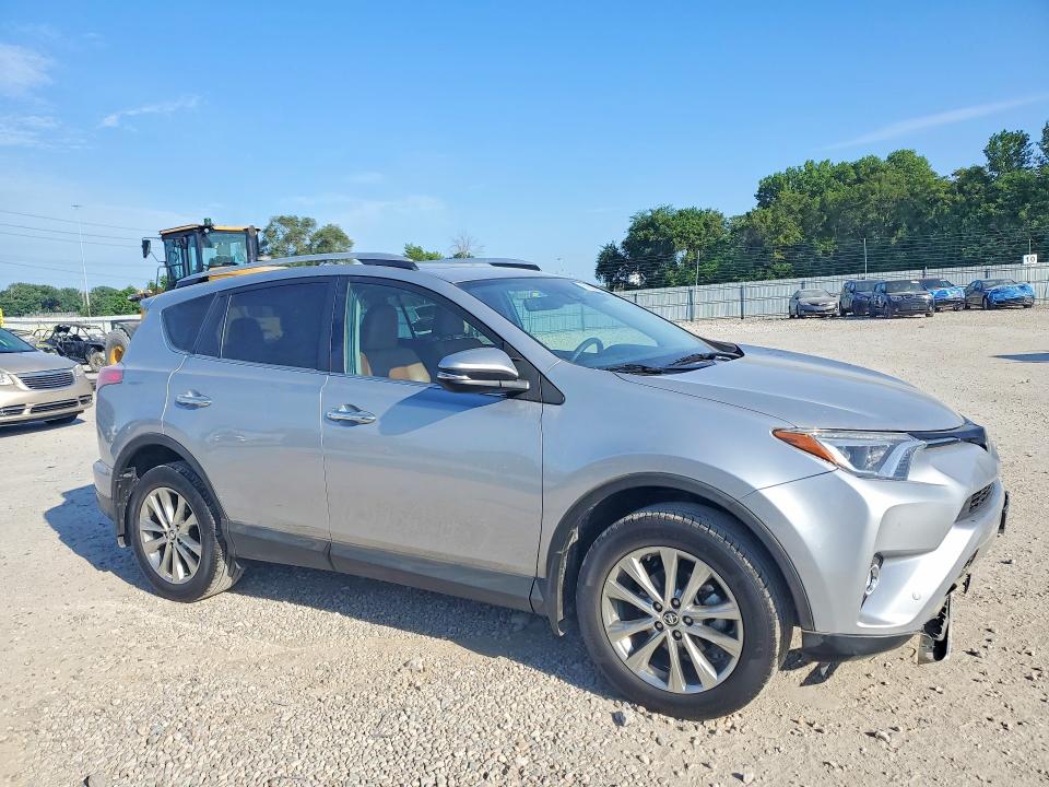 Photo 4 from auction – 2016 TOYOTA RAV4 with VIN 2T3DFREV4GW501472