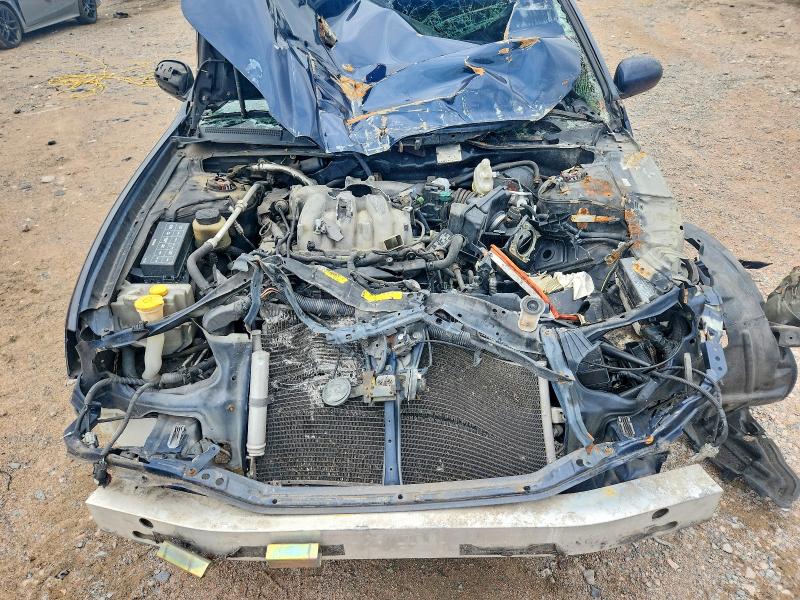 Photo 11 from auction – 2003 NISSAN MAXIMA with VIN JN1DA31DX3T509231