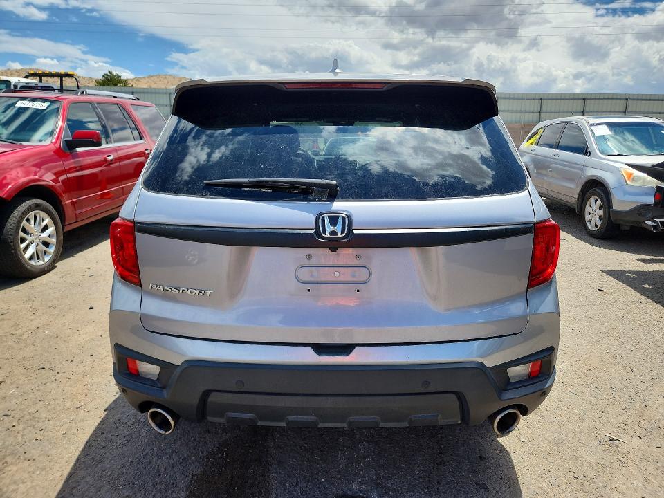 Photo 6 from auction – 2022 HONDA PASSPORT with VIN 5FNYF7H55NB005827