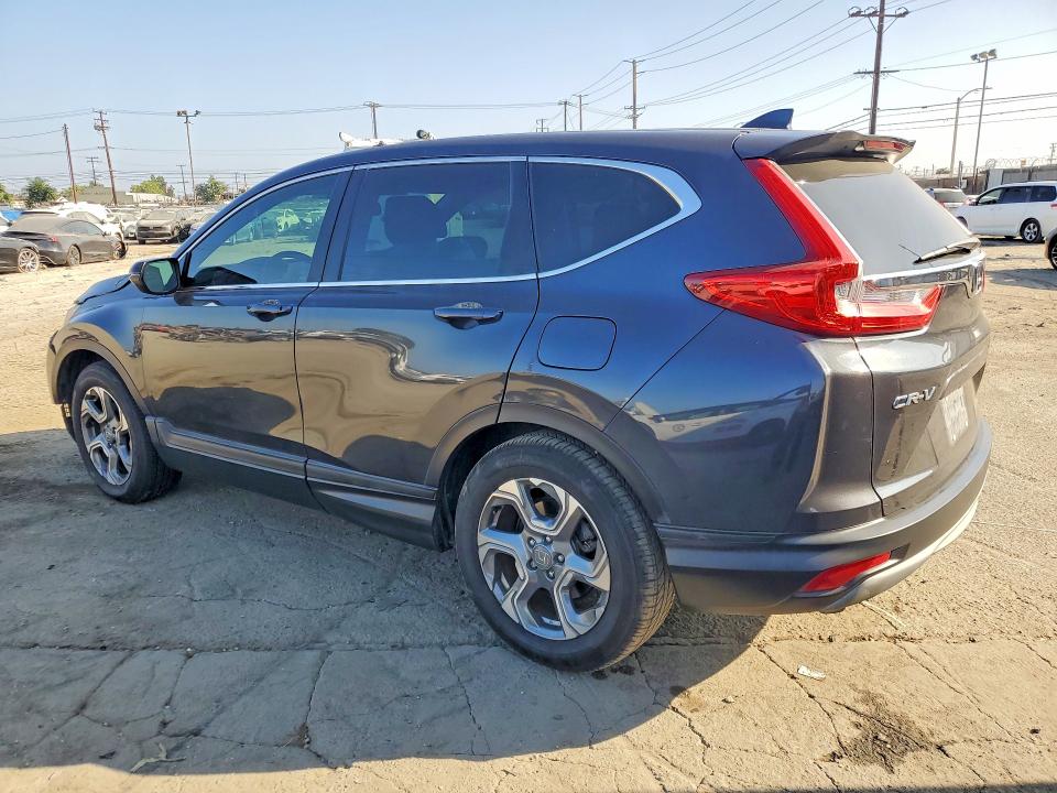 Photo 2 from auction – 2017 HONDA CR-V with VIN 7FARW1H88HE011464