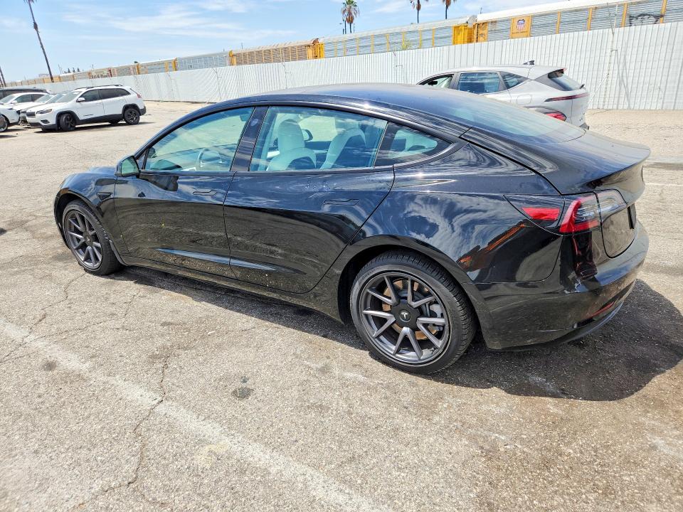 Photo 2 from auction – 2021 TESLA MODEL 3 with VIN 5YJ3E1EBXMF004448