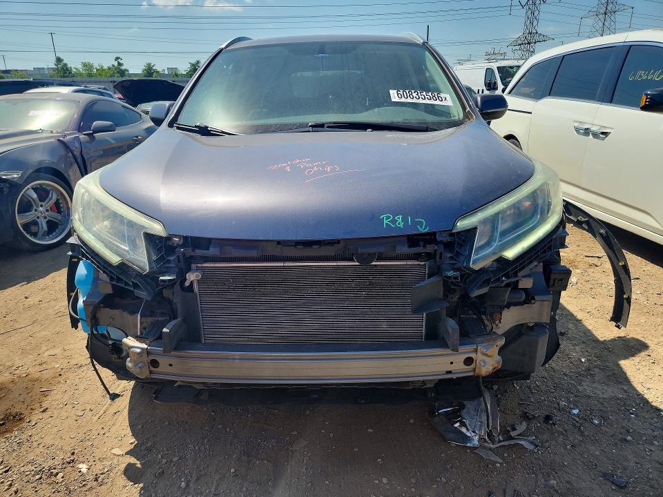 Photo 5 from auction – 2015 HONDA CR-V with VIN 2HKRM4H74FH606885