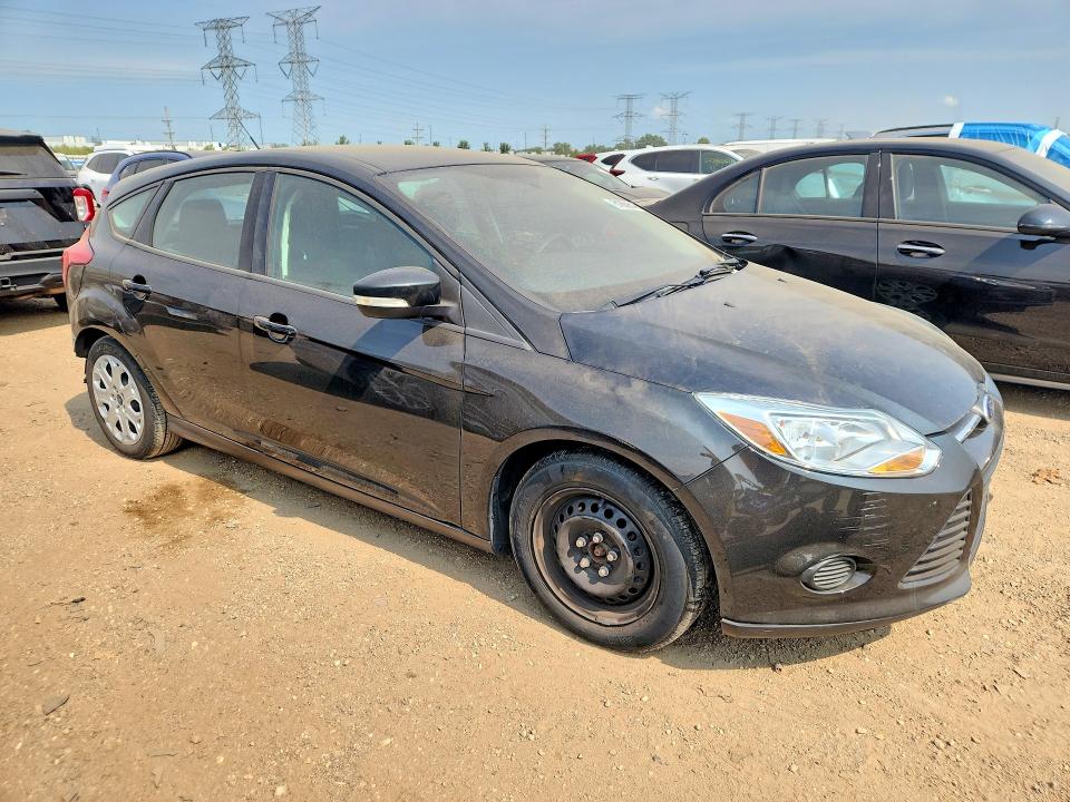 Photo 4 from auction – 2014 FORD FOCUS with VIN 1FADP3K22EL384601