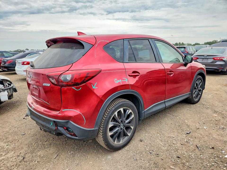 Photo 3 from auction – 2016 MAZDA CX-5 with VIN JM3KE4DY1G0860377