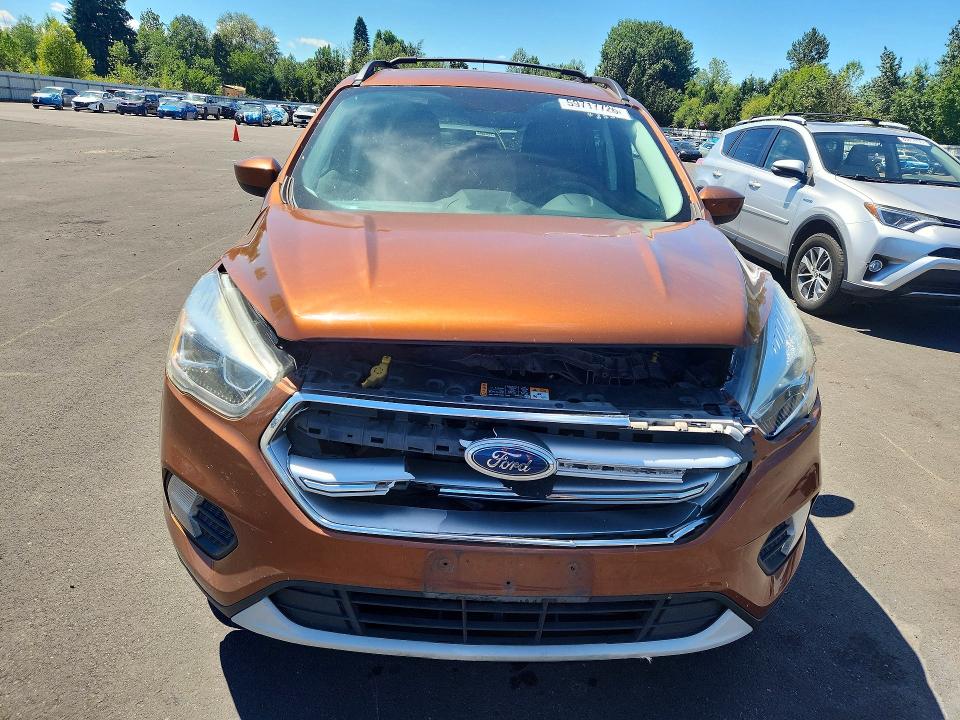 Photo 5 from auction – 2017 FORD ESCAPE with VIN 1FMCU9GDXHUE56151