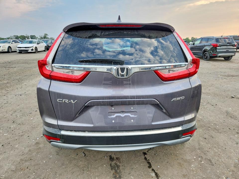 Photo 6 from auction – 2018 HONDA CR-V with VIN 7FARW2H84JE082642