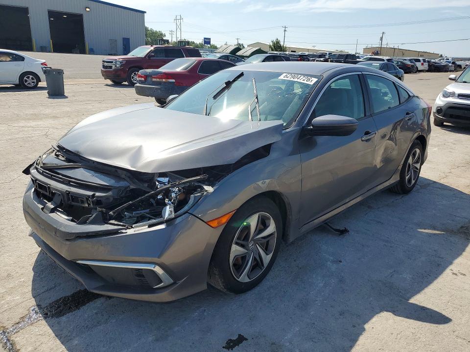 HONDA CIVIC 2019 with VIN 19XFC2F69KE010982 - Photo from auction