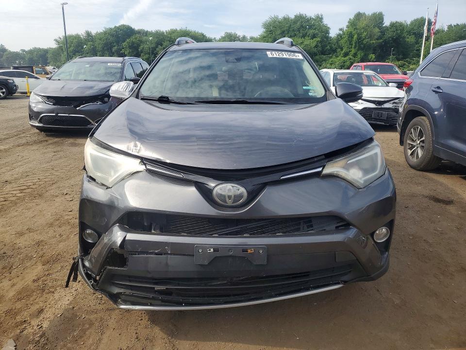 Photo 5 from auction – 2018 TOYOTA RAV4 with VIN JTMRFREV7JJ735018