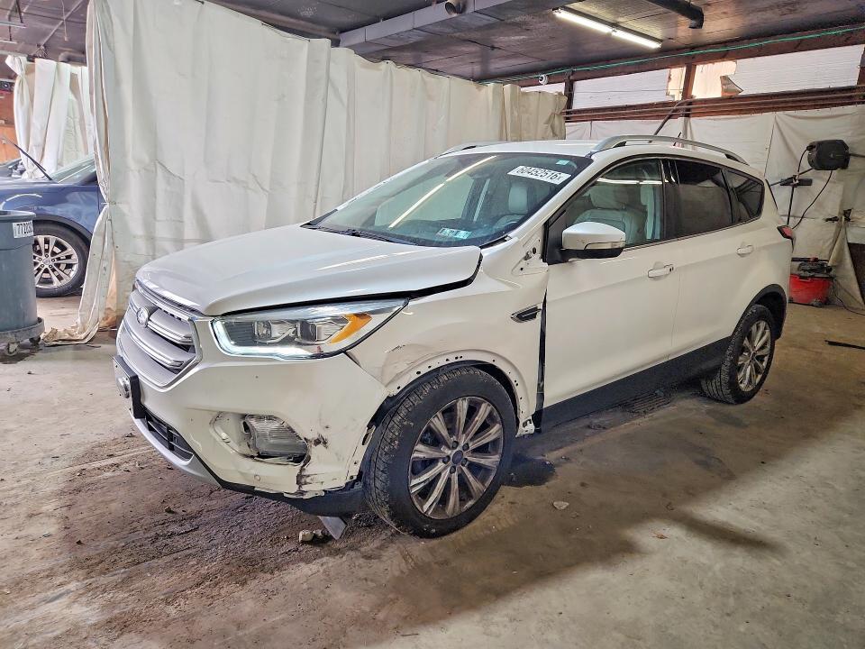 FORD ESCAPE 2018 with VIN 1FMCU9J92JUB21279 - Photo from auction