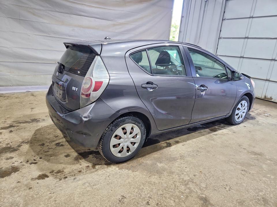 Photo 3 from auction – 2013 TOYOTA PRIUS C with VIN JTDKDTB33D1554039