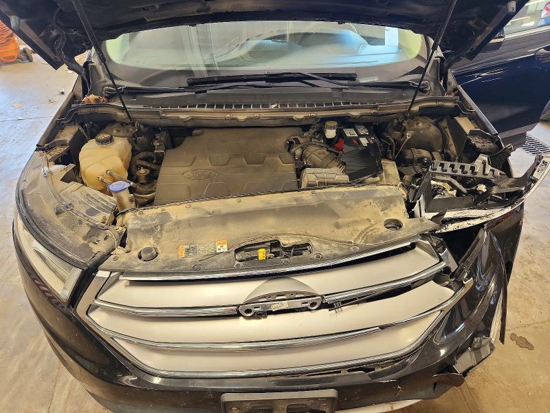 Photo 11 from auction – 2016 FORD EDGE with VIN 2FMPK3J83GBC36354