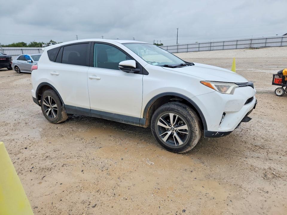 Photo 4 from auction – 2018 TOYOTA RAV4 with VIN 2T3WFREV4JW467761