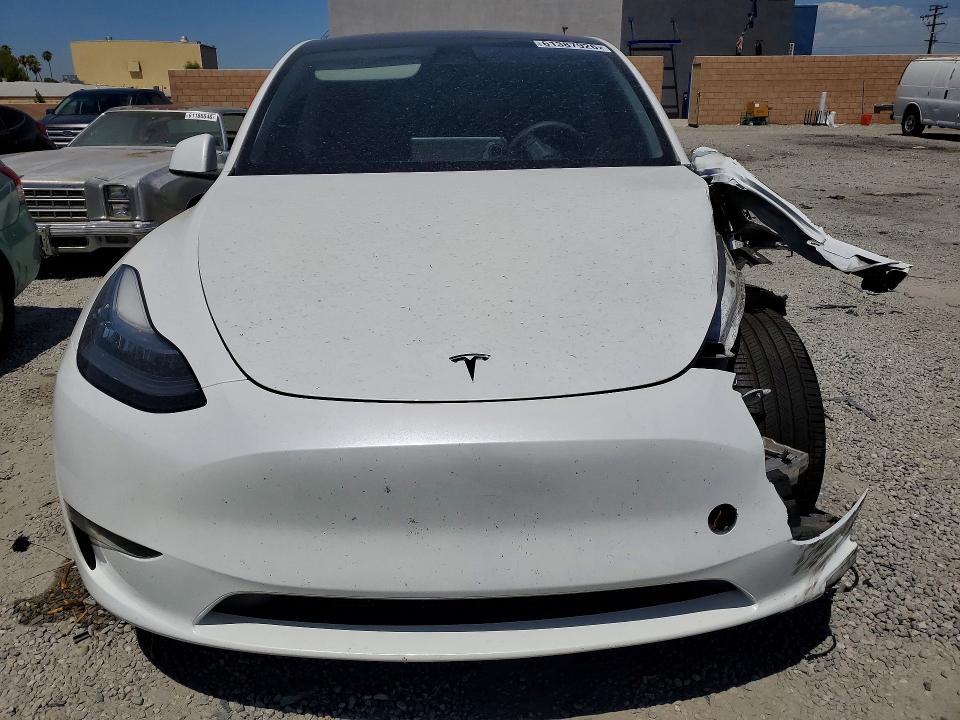 Photo 5 from auction – 2023 TESLA MODEL Y with VIN 7SAYGDEE4PA080151