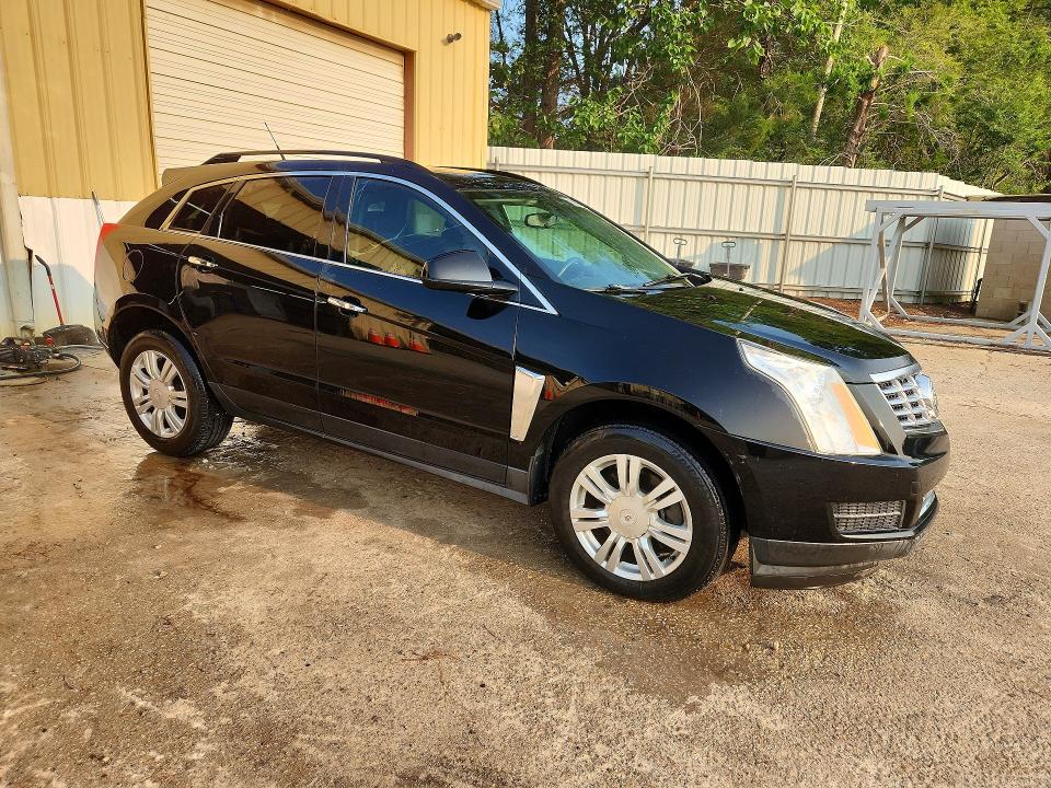 Photo 4 from auction – 2013 CADILLAC SRX with VIN 3GYFNAE32DS623133