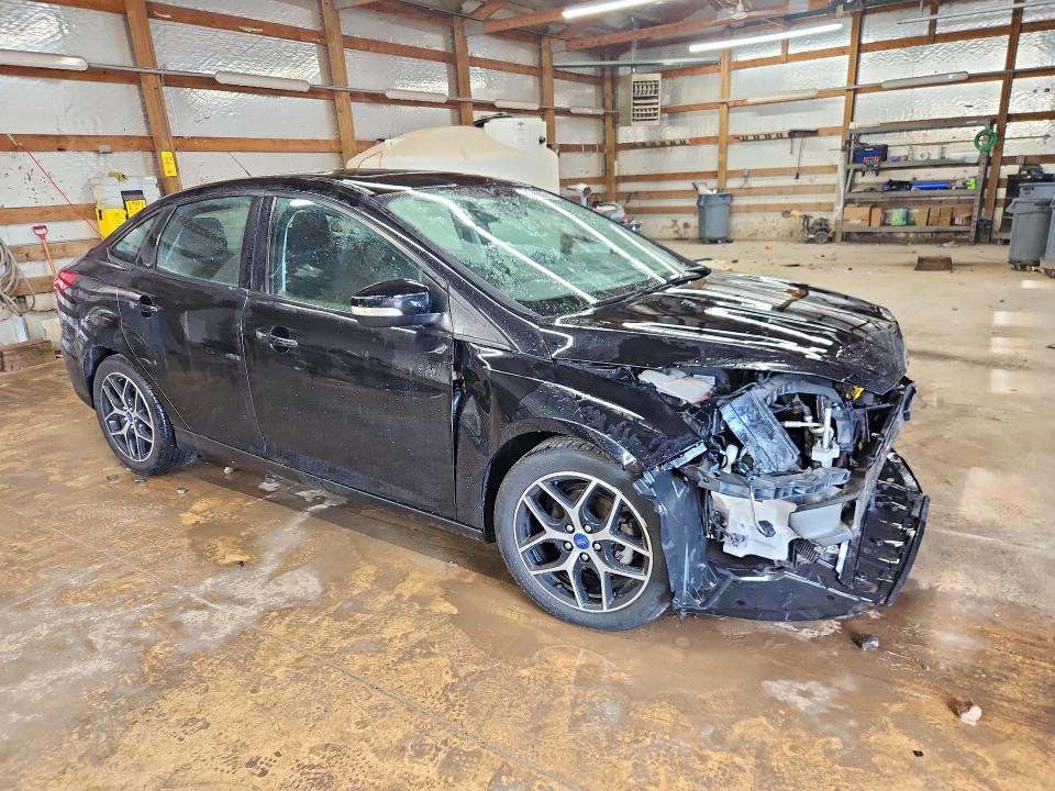 Photo 4 from auction – 2017 FORD FOCUS with VIN 1FADP3H29HL313410