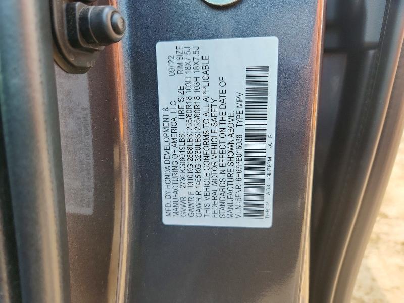 Photo 14 from auction – 2023 HONDA ODYSSEY with VIN 5FNRL6H67PB016038