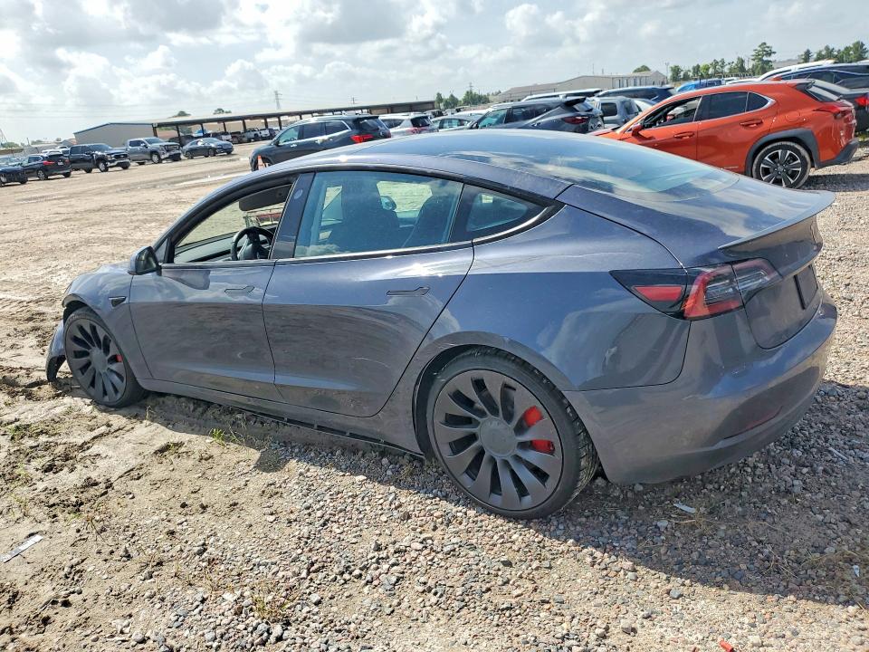 Photo 2 from auction – 2021 TESLA MODEL 3 with VIN 5YJ3E1EC0MF094833