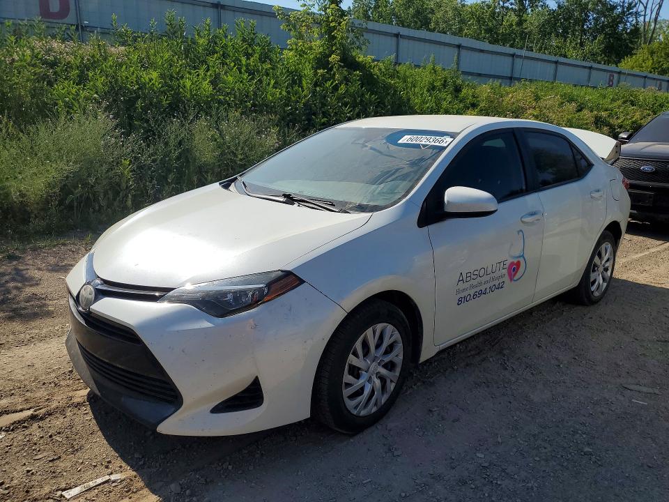 TOYOTA COROLLA 2017 with VIN 5YFBURHE3HP699983 - Photo from auction