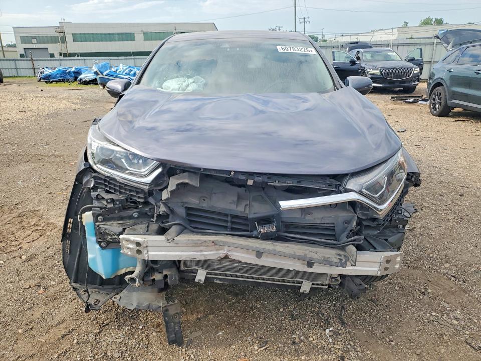 Photo 5 from auction – 2018 HONDA CR-V with VIN 7FARW2H5XJE048842