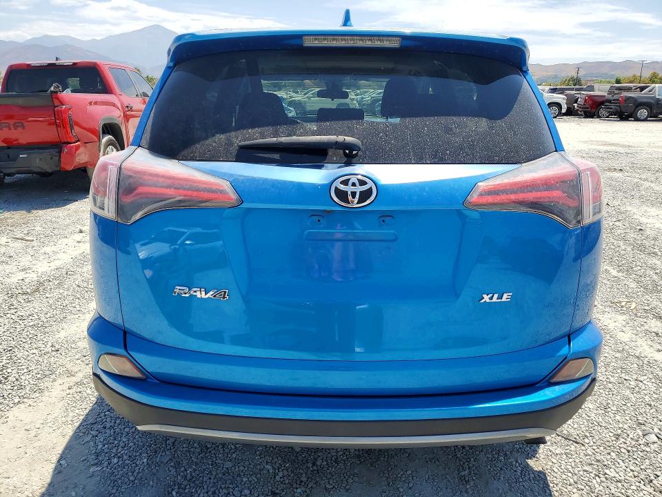 Photo 6 from auction – 2018 TOYOTA RAV4 with VIN JTMWFREV0JJ193229