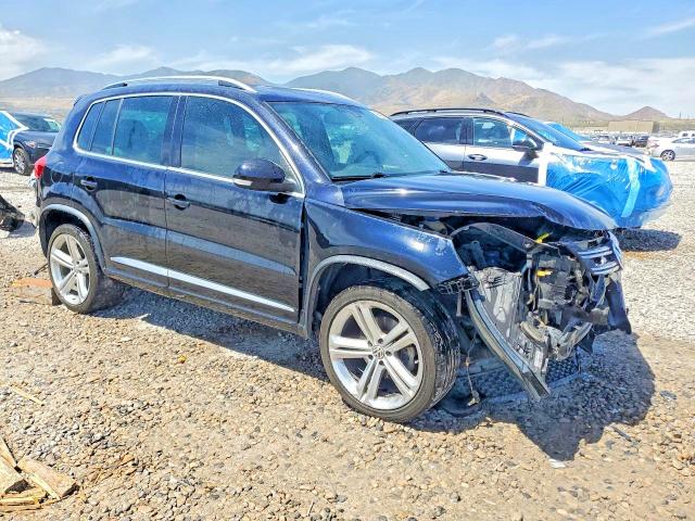 Снимка 4 от търг – 2014 VOLKSWAGEN TIGUAN с VIN WVGBV3AX2EW084670